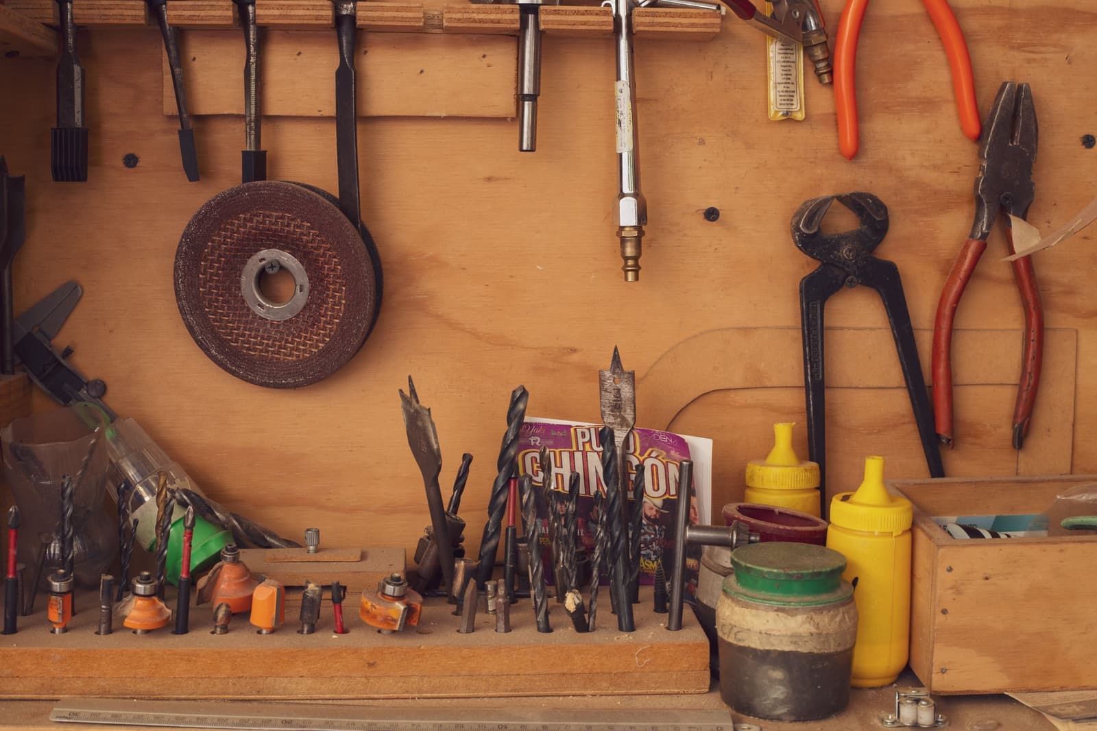 Carpentry tools arranged on a traditional workshop bench